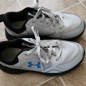 Under Armour Kids White Sneakers with Black Accents and Blue Logo